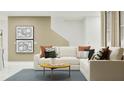Cozy living room with neutral sectional sofa, area rug, and modern wall art at 3007 Maloof Dr, Davenport, FL 33837