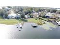 House on lakefront lot with boat and dock at 2 Se Chinica Dr, Summerfield, FL 34491