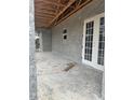 Covered patio with double french doors at 5938 Nw 8Th Pl, Ocala, FL 34482