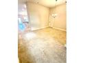 A large open concept dining room with neutral colored walls and ample square footage at 3127 Ne 45Th Ave, Ocala, FL 34470