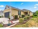 One-story house with a two-car garage and well-manicured landscaping at 9873 Sw 99Th Loop, Ocala, FL 34481