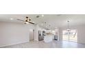 Modern kitchen featuring stainless steel appliances and an island at 11 Emerald Trl, Ocala, FL 34472