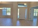 Bright foyer with tile floors and an abundance of natural light at 2536 Sw 165Th Street Rd, Ocala, FL 34473