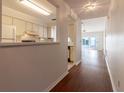 Hallway view of kitchen and living room at 2444 Se 18Th Cir, Ocala, FL 34471