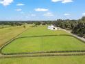 Farmland with arena and barn; perfect for horses at 8544 Nw 160Th Ave, Morriston, FL 32668