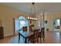 Formal dining room with hardwood floors and a chandelier at 5622 Nw 27Th Pl, Ocala, FL 34482