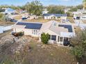 Aerial view showcasing the home's solar panels and backyard at 8968 Sw 116Th Place Rd, Ocala, FL 34481