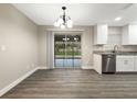 Dining area with sliding glass doors leading to the backyard at 7 Teak Loop Pl, Ocala, FL 34472