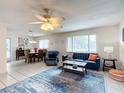 Bright and airy living room with a dining area at 8955 Sw 104Th Pl, Ocala, FL 34481