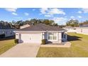 One-story house with a two-car garage and spacious yard at 4955 Se 89Th Place Rd, Ocala, FL 34480