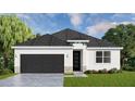 Single-story home with dark garage door, white walls, and landscaping at 13143 Sw 67Th Ave, Ocala, FL 34473