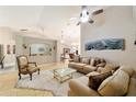 Spacious living room featuring neutral tones, tile floors and cozy seating at 2105 Sw 4Th St, Ocala, FL 34471