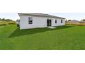 Large backyard with grassy lawn at 3588 Sw 127Th Lane Rd, Ocala, FL 34473