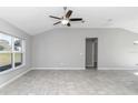 Spacious living room featuring tile floors and high ceilings at 963 Nw 65Th St, Ocala, FL 34475