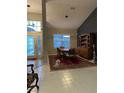 Bright dining room featuring a formal table, chairs, and a hutch at 11557 Sw 75Th Cir, Ocala, FL 34476