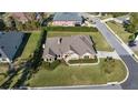 Bird's eye view of a house with a spacious backyard and driveway at 4020 Se 9Th Ave, Ocala, FL 34480