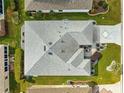 Top-down view of house, showing roofline and landscaping at 1918 Walden Way, The Villages, FL 32162