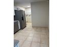 Kitchen with view into laundry room and pantry at 2317 Ne 37Th St, Ocala, FL 34479