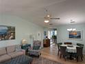 Elegant dining area with a round table and decorative hutch at 11490 Sw 85Th Ave, Ocala, FL 34481