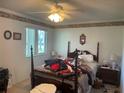 Bedroom with a double bed and wooden furniture at 533 Midway Dr # B, Ocala, FL 34472