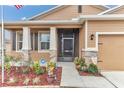 Inviting home exterior featuring a screened porch and landscaped yard at 6158 Sw 88Th Loop, Ocala, FL 34476