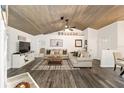 Spacious living area with vaulted ceiling and neutral decor at 13740 Sw 49Th Pl, Ocala, FL 34481