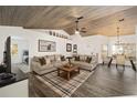 Open living space with comfortable seating and a view to bedroom at 13740 Sw 49Th Pl, Ocala, FL 34481
