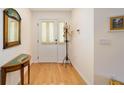 Bright entryway with hardwood floors and decorative accents at 8086 Sw 81St Loop, Ocala, FL 34476