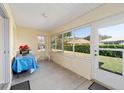 Bright Florida room with plenty of natural light and backyard access at 8086 Sw 81St Loop, Ocala, FL 34476