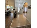 Bright entryway with tile flooring and access to dining area at 1060 Sw Big Tree Rd, Dunnellon, FL 34431