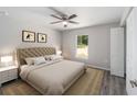 Spacious bedroom with a king-size bed and neutral color palette at 1280 Nw Redwood Dr, Dunnellon, FL 34431