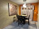 Small dining area with four chairs and wall art at 14419 Sw 43Rd Court Rd, Ocala, FL 34473