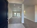 Bright and spacious entryway with view into the living room at 5110 Sw 92Nd St, Ocala, FL 34476