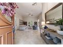 Bright and spacious entryway with tile floors and views into the living room at 1105 Se 48Th Ave, Ocala, FL 34471