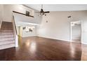 High ceiling living room with loft and hardwood floors at 1903 Se 37Th Court Cir, Ocala, FL 34471