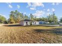 Newly built home on a spacious lot with surrounding trees at 2388 Sw 143Rd Ct, Ocala, FL 34481