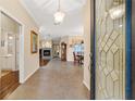 Bright and spacious entryway with tile flooring and views into living areas at 4911 Sw 63Rd Loop, Ocala, FL 34474