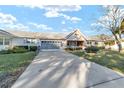 House exterior with a driveway and landscaping at 8961 Sw 94Th Ln # C, Ocala, FL 34481