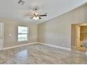 Spacious living room featuring tile floors and high ceilings at 2308 Sw 168Th Loop, Ocala, FL 34473