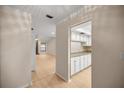 Bright kitchen featuring white cabinetry, granite countertops, and stainless steel appliances at 3856 Ne 19Th Street Cir, Ocala, FL 34470