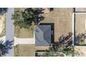 An aerial view of the home showing the roof and surrounding landscape at 4069 Sw 130Th Pl, Ocala, FL 34473