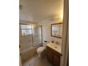 Bathroom with shower/tub combo, vanity, and mirror at 8208 Fairways Cir # B101, Ocala, FL 34472