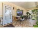 Inviting front porch with seating area, perfect for relaxing at 8738 Sw 90Th St # B, Ocala, FL 34481