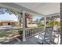 Relaxing front porch view overlooking a peaceful neighborhood at 9802 Sw 88Th Ter # A, Ocala, FL 34481