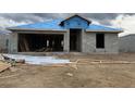 View of an exterior elevation of a building under construction, with an open garage at 2154 Nw 23Rd Loop, Ocala, FL 34475