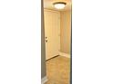 Simple entryway with six-panel door and tile floor at 23104 Sandalwood Dr # 104, Wildwood, FL 34785