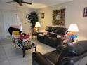 Bright living room featuring comfortable seating and decorative accents at 10800 Sw 62Nd Ave, Ocala, FL 34476