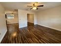 Bright living room with hardwood floors and ceiling fan at 11440 Sw 85Th Ave, Ocala, FL 34481