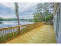 Spacious deck overlooking a tranquil lake at 13055 Ne 7Th Loop, Silver Springs, FL 34488