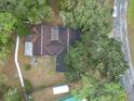 Aerial view of the house showing backyard and shed at 1910 Se 170Th Avenue Rd, Silver Springs, FL 34488